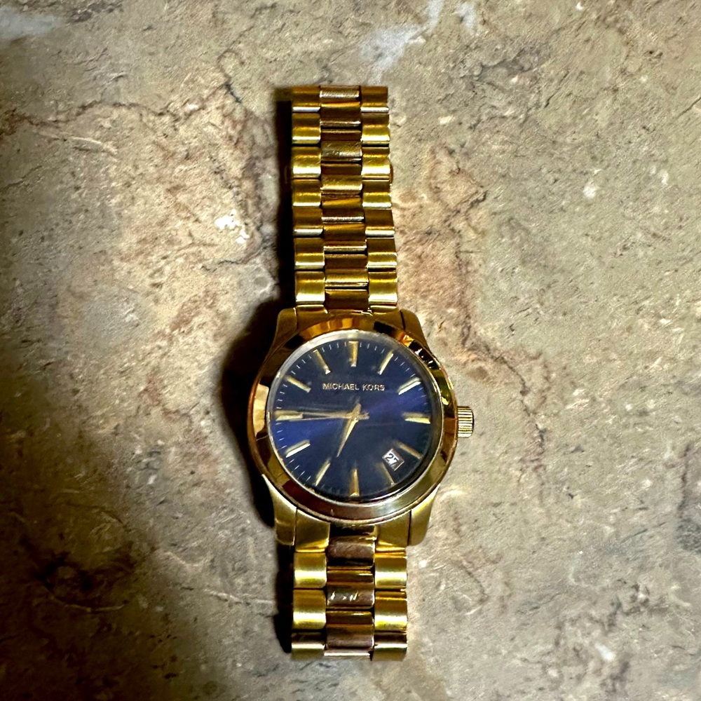 Michael Kors gold tone, blue face watch